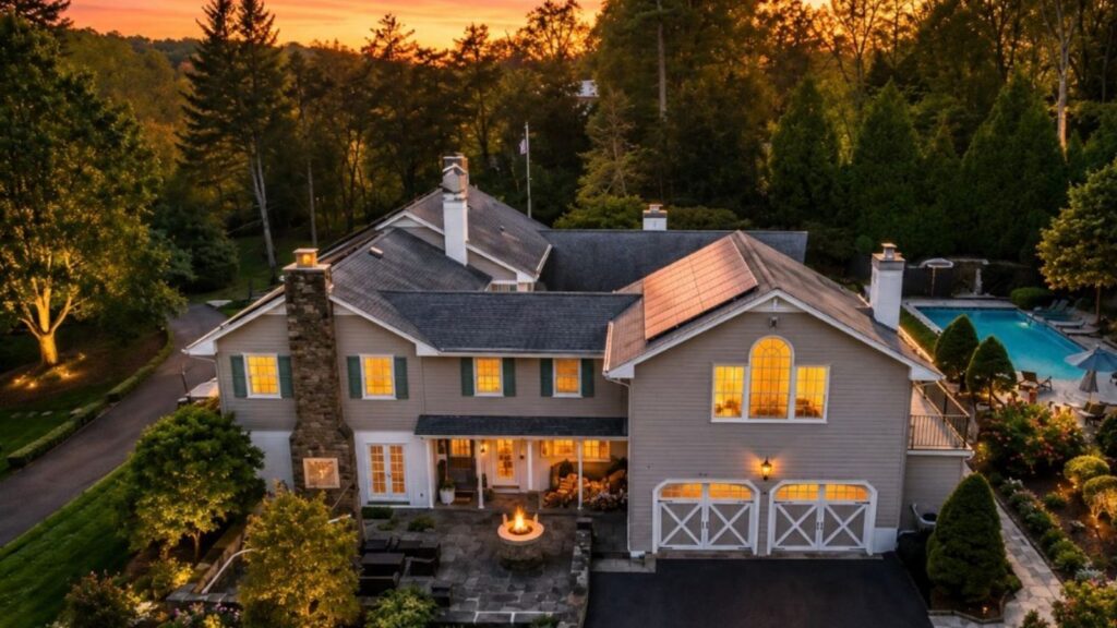 Stone luxury estate at dusk in Doylestown, PA
