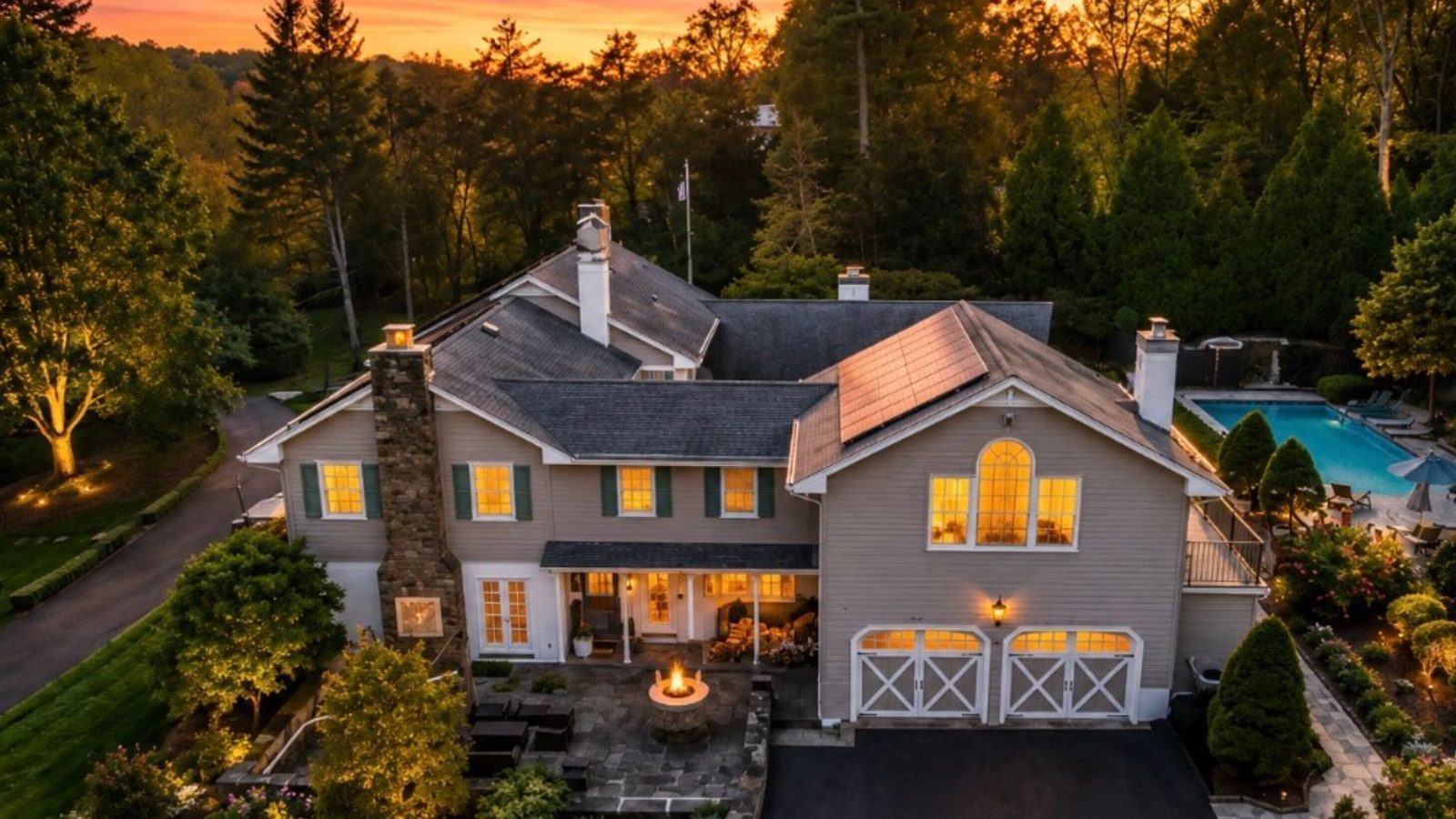 Stone luxury estate at dusk in Doylestown, PA